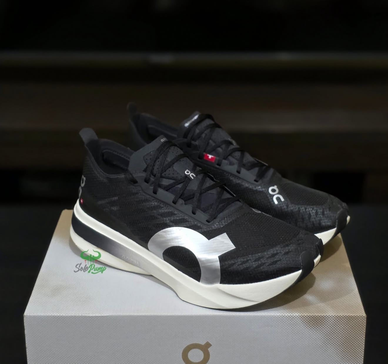 On Cloudboom Strike Black White