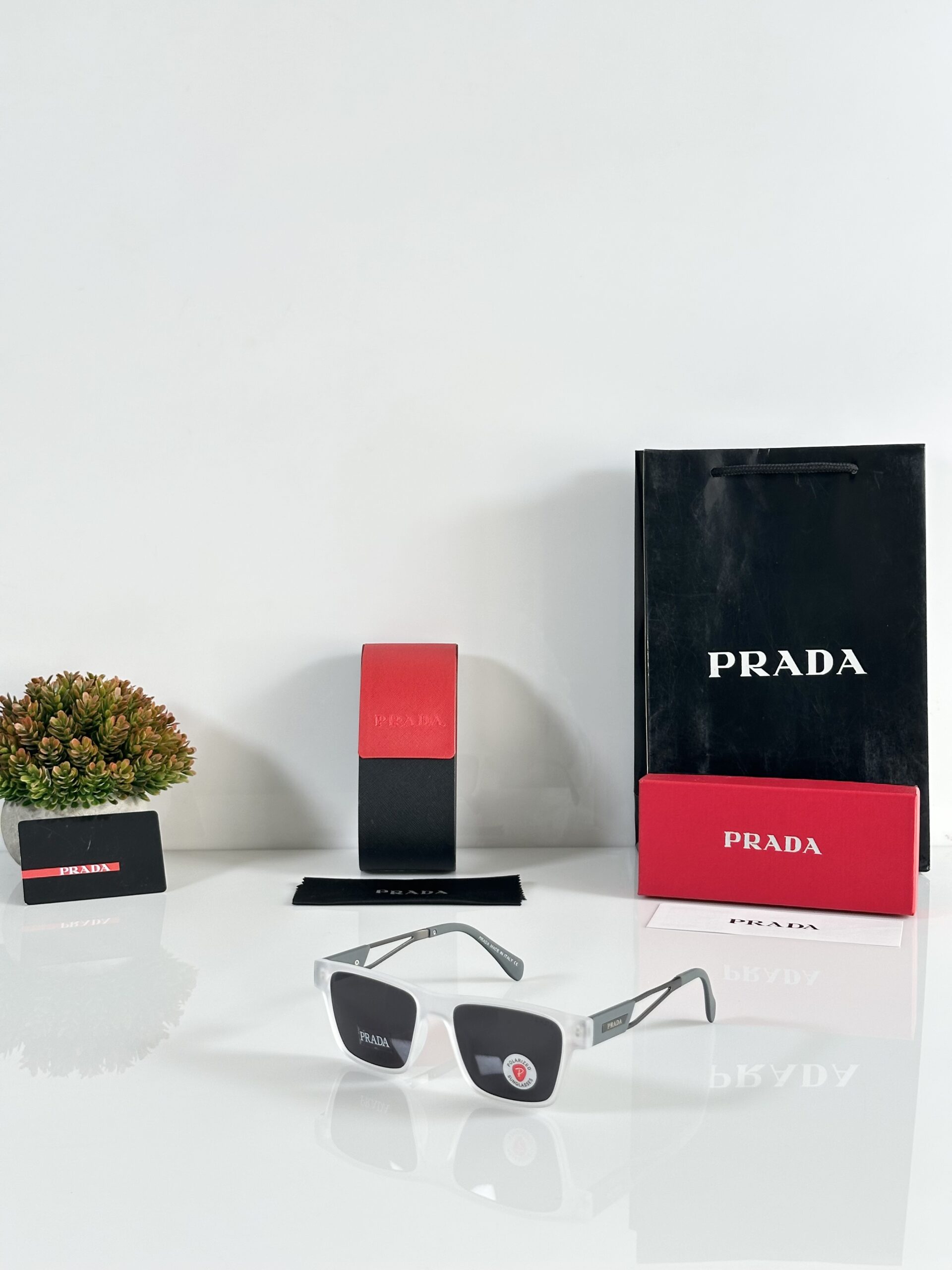 Prada_144_Ice_Black_Grey_Stick